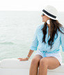 Woman sailing in a boat