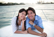 Happy couple in a yacht