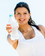 Healthy woman drinking water
