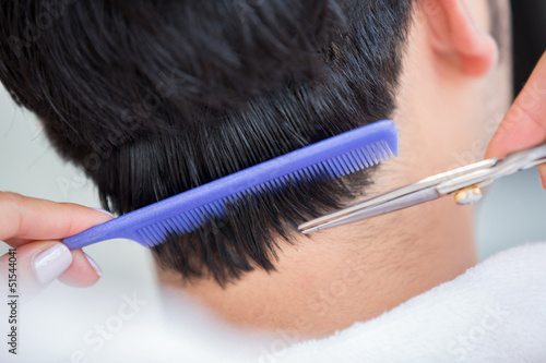 Photo: Man getting a haircute Man getting a haircute