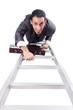 Businessman climbing the ladder isolated on white