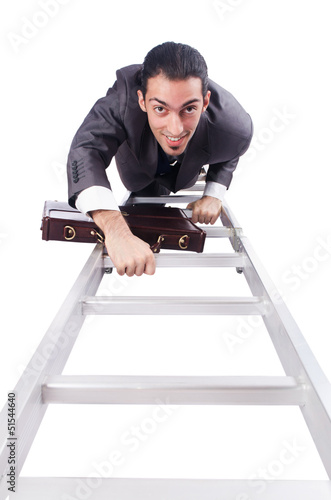 Photo: Businessman climbing the ladder isolated on white Businessman climbing the ladder isolated on white