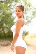 Beautiful woman enjoys summer