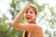 Beautiful woman enjoys summer