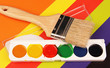 watercolor paint and brush.