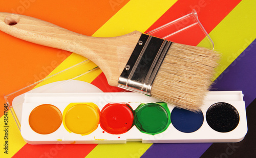 Photo: watercolor paint and brush. watercolor paint and brush.