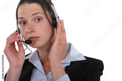Photo: Young woman with headset Young woman with headset