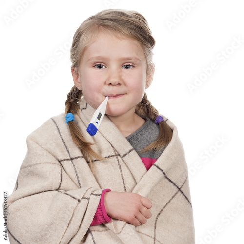 Photo: Sick child with a thermometer Sick child with a thermometer
