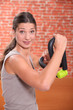 Photo: Woman doing weight training Woman doing weight training