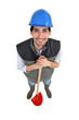 Landscape gardener stood with shovel