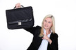 businesswoman holding a brief case