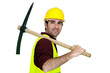 Laborer with pickaxe on his shoulder
