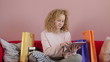 Young woman looking over bills