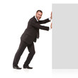 Businessman pushing away something