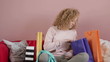 Young woman looking worried over bills