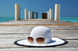 Hat and sunglasses on the wooden jetty. Exuma, Bahamas