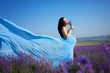 Pregnant woman on lavender field