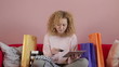 Young woman buying on line with her credit card