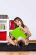 Little girl reading a book