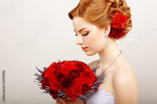 Photo: Mildness. Woman with Bouquet of Flowers. Tranquility Mildness. Woman with Bouquet of Flowers. Tranquility