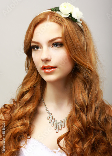 Photo: Happy Golden Hair Woman with Flower. Femininity & Sensuality Happy Golden Hair Woman with Flower. Femininity & Sensuality