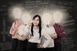 Business manager and team with light bulb heads