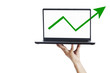 Success arrow sign on laptop