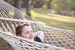 Young Boy Enjoying A Day in His Hammock