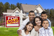 Photo: Hispanic Family in Front of Sold Real Estate Sign, House Hispanic Family in Front of Sold Real Estate Sign, House