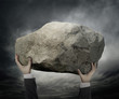 Photo: Businessman Hold stone Businessman Hold stone