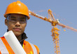 Close up site manager with safety vest under construction