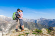 Couple Kissing at Top of Mountain