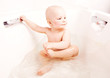 Foto: baby taking a bath baby taking a bath