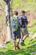 Photo: Young Couple Hiking in the Nature Young Couple Hiking in the Nature