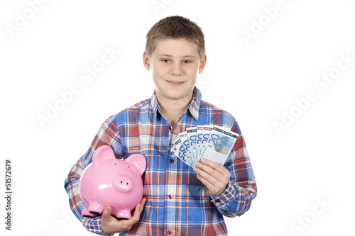 Photo: Cute boy with piggy bank and banknote Cute boy with piggy bank and banknote