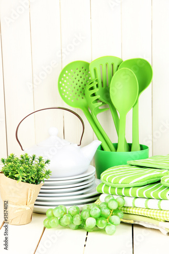 Photo: Kitchen settings: utensil, potholders, towels and else Kitchen settings: utensil, potholders, towels and else