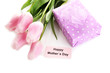 Beautiful bouquet of pink tulips and gift for Mother's Day,