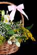 Bouquet of flowers in basket close-up