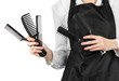 Hairdresser in uniform with working tools, isolated on white