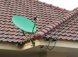 Photo: Satellite dish on the roof of tile Satellite dish on the roof of tile