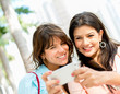 Girls texting from a phone