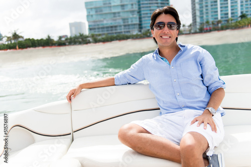 Photo: Man relaxing on a yacht Man relaxing on a yacht