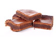 Slices of a brownie on white background
