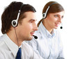 Attractive young people working in a call center
