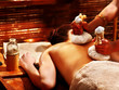 Woman having massage with pouch.