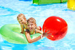 Child on water slide at aquapark.
