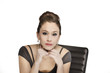 Photo: Business young woman listening intently Business young woman listening intently