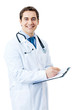 Happy smiling doctor writing on clipboard, isolated
