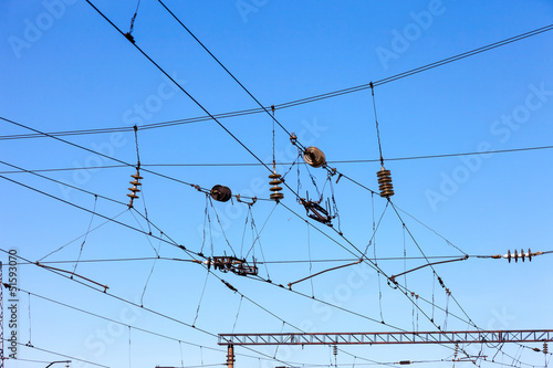 Photo: Railroad overhead lines against clear blue sky, Contact wire Railroad overhead lines against clear blue sky, Contact wire