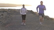Tired woman catching breath during jogging, super slow motion